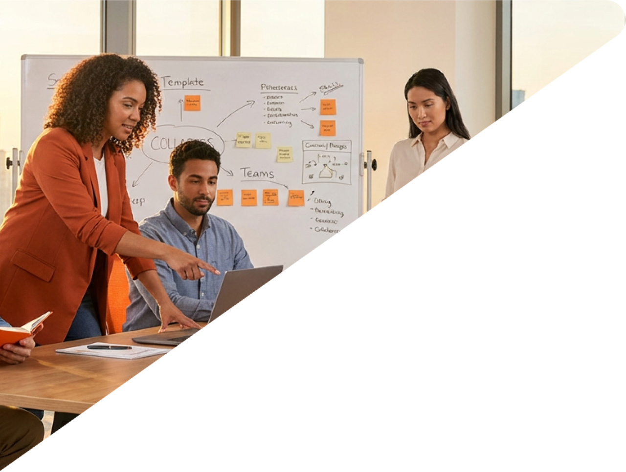 Photography of a modern office with young people chatting and working on computers